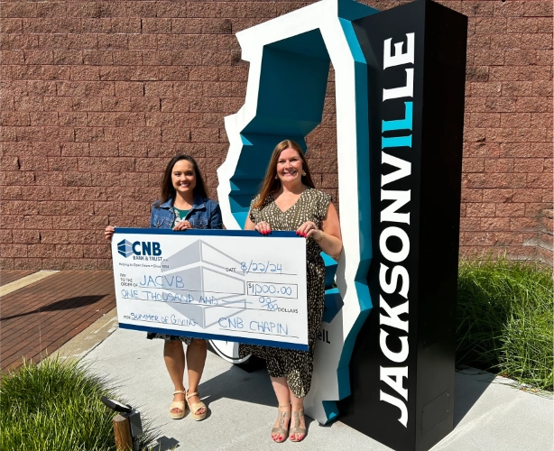 CNB presents check to Jacksonville Area Convention and Visitors Bureau